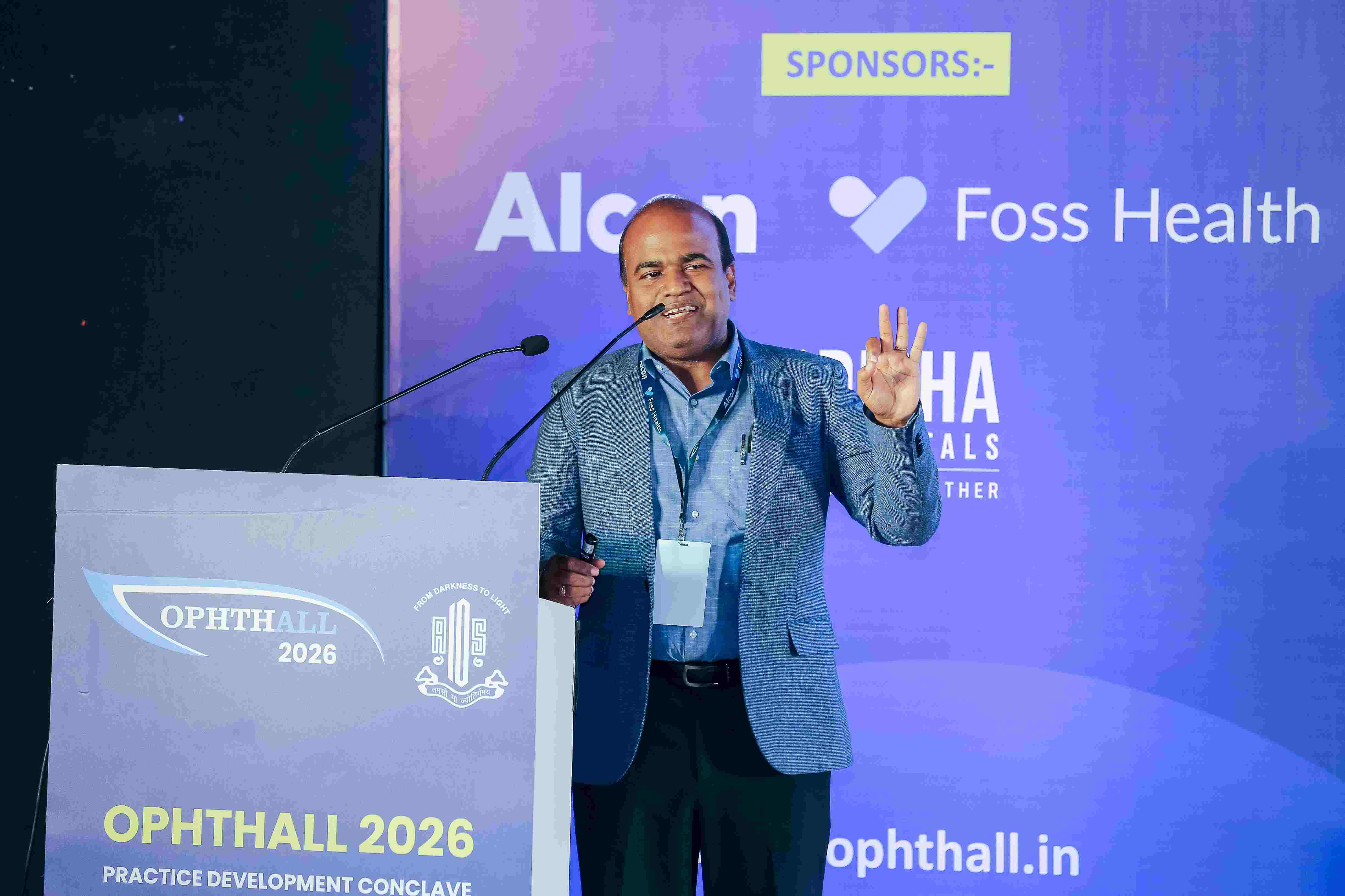 Dr. Senthil speaking at an eye care event